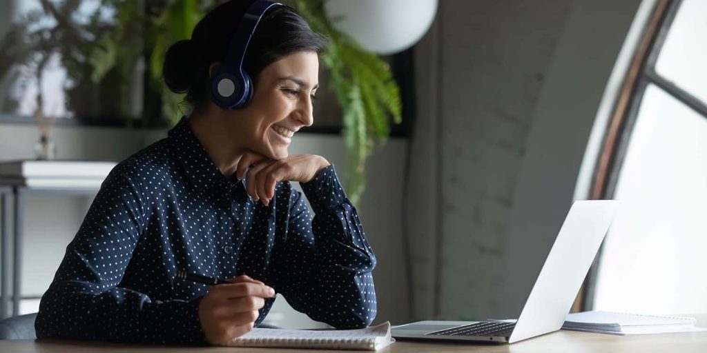 woman wearing a headset working